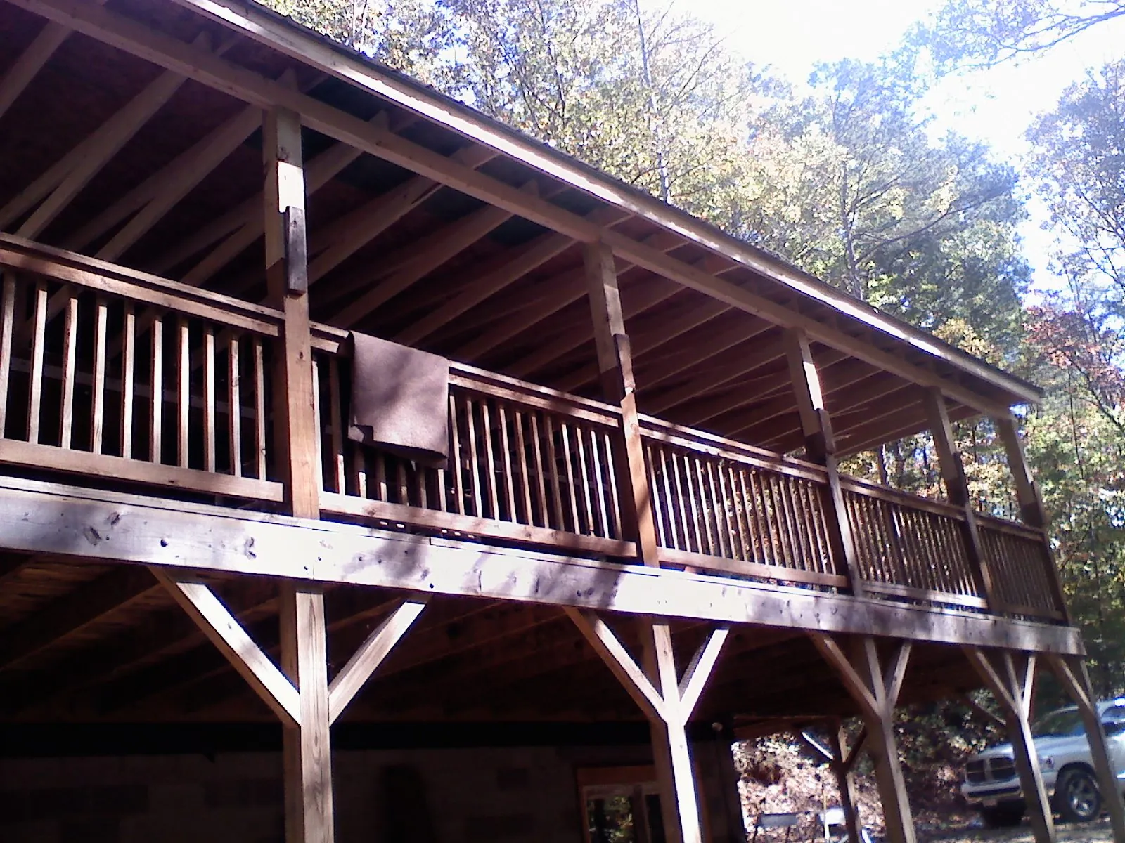 Timber framing under a new elevated porch and deck — Roof Leak Repair in Royal Oak by Roofing Brothers